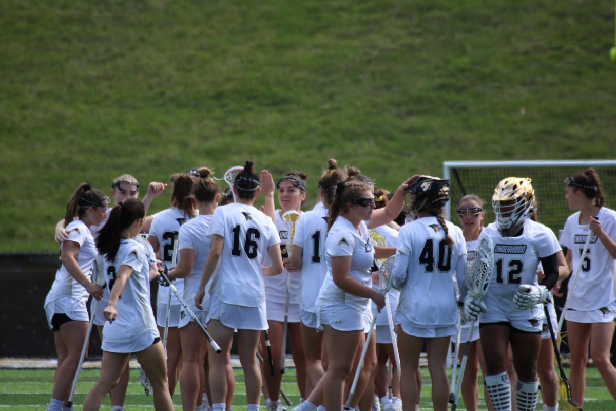 The Lindenwood Lions womens lacrosse team celebrates together after a win over Youngstown University. 