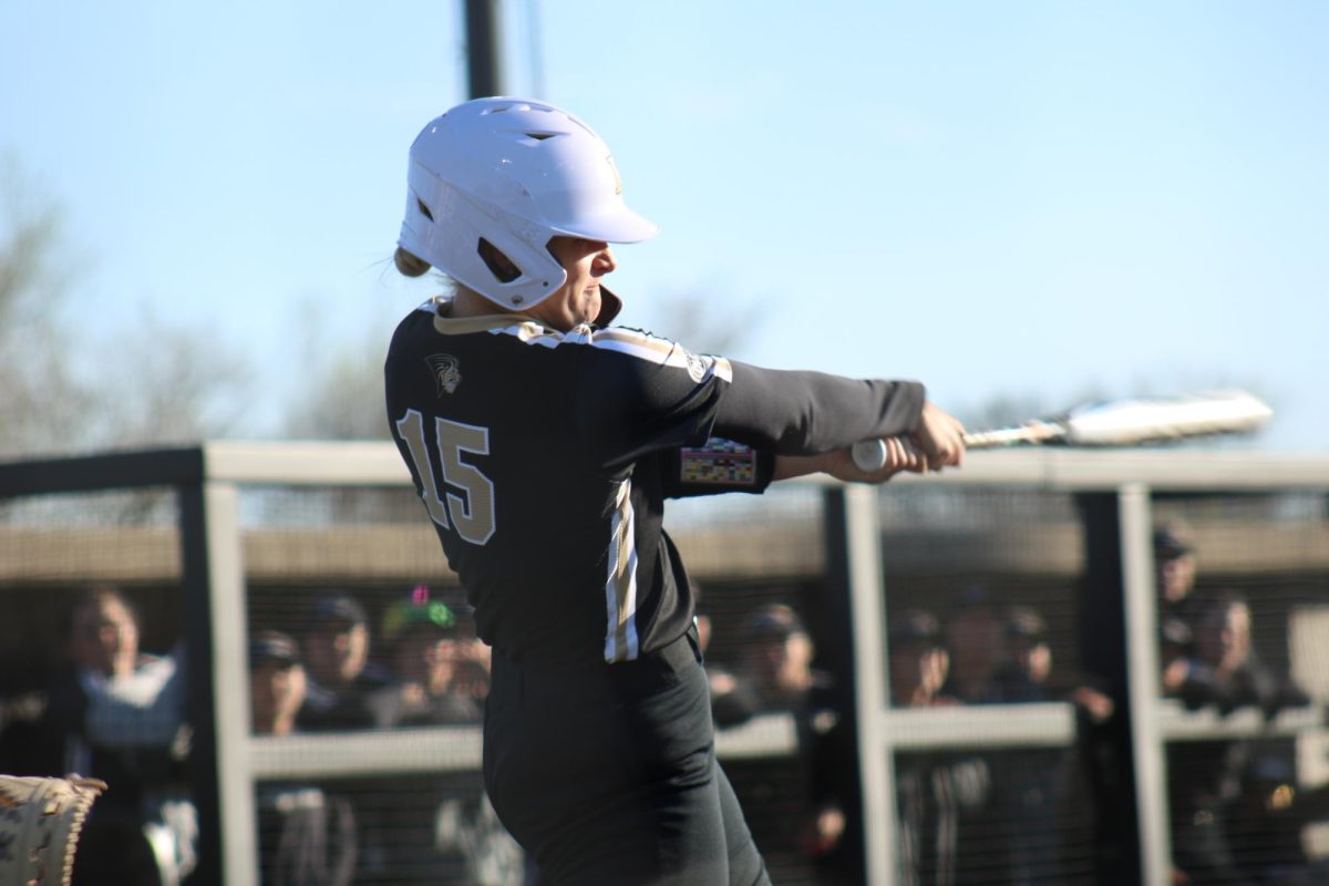 Izzy Wilcox swings at a pitch in a game against St. Louis University. 