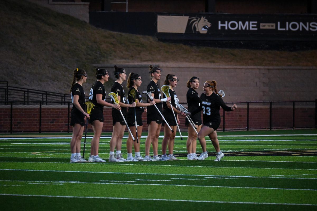 Lindenwoods womens lacrosse team greet each other prior to a game against Kent State University. 