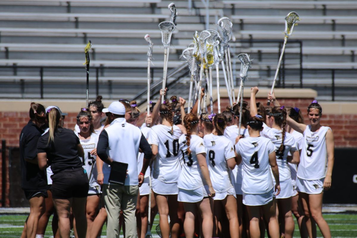 The Lindenwood women’s lacrosse team huddles between periods in a game against Kennesaw State University.