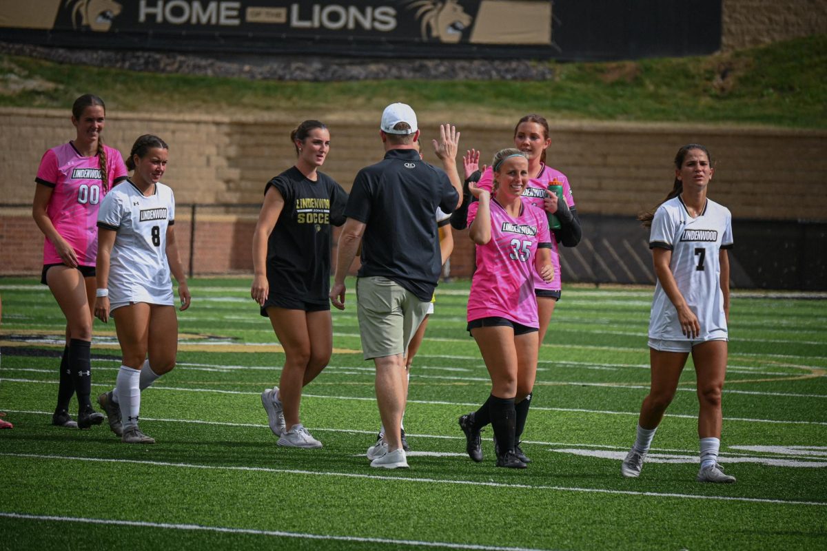 The Lindenwood Lion's women's soccer team celebrates after a win against Western Illinois. 