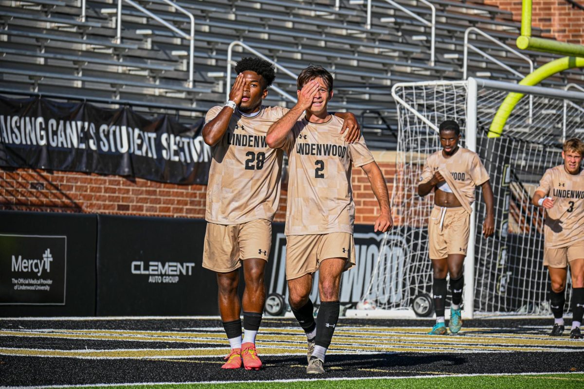 Josh Francombe and Jordan Matthews celebrate a goal against Eastern Illinois University. 