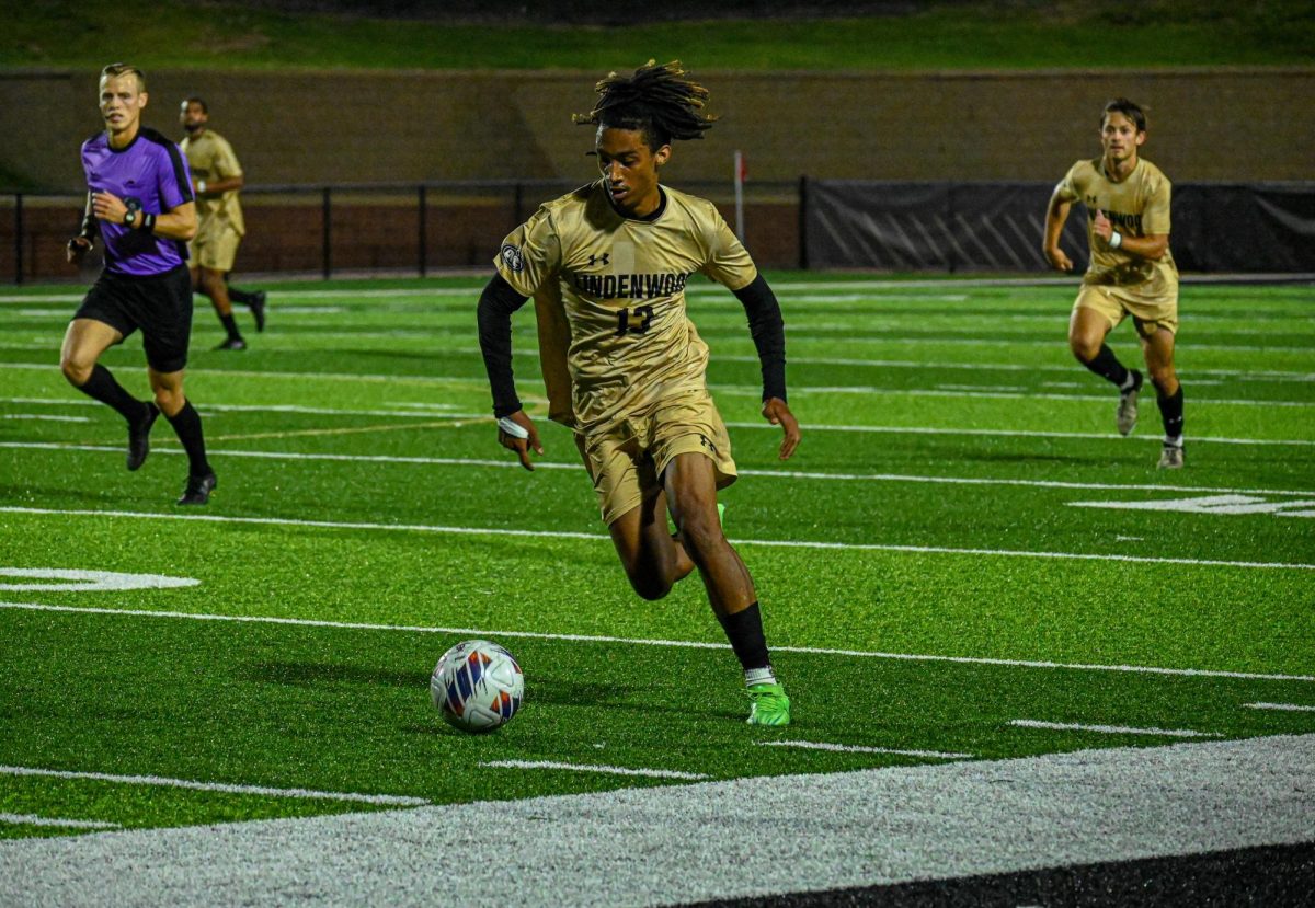 Parker Smith moves the ball down pitch in a game against SIUE. 