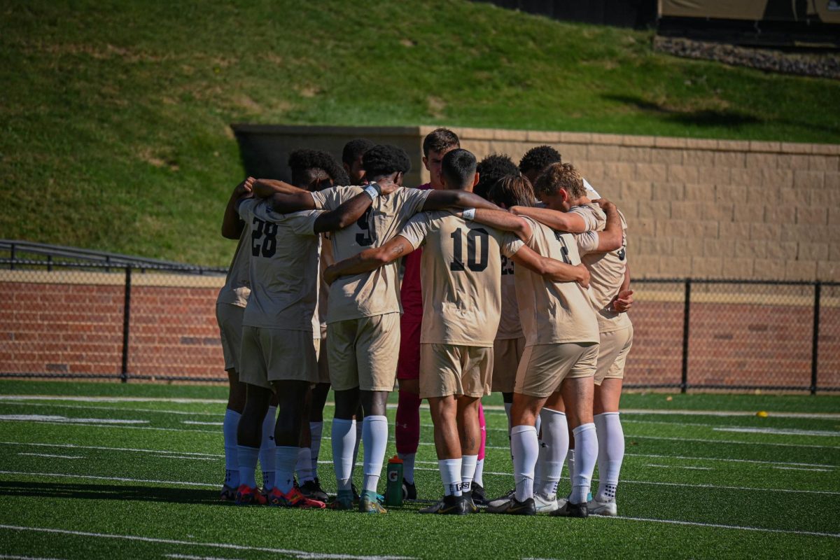 The Lindenwood men's soccer team huddles after a win against Western Illinois University. 