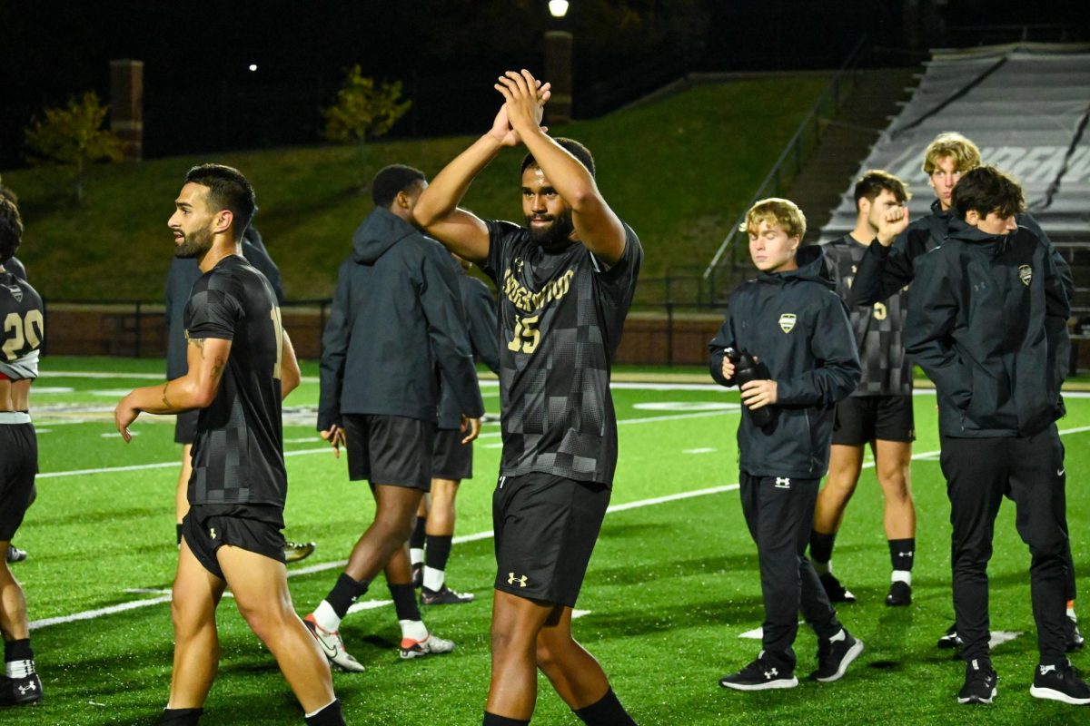 Noe Bijou, who scored the lone goal of the game, celebrates after a win against Liberty University.