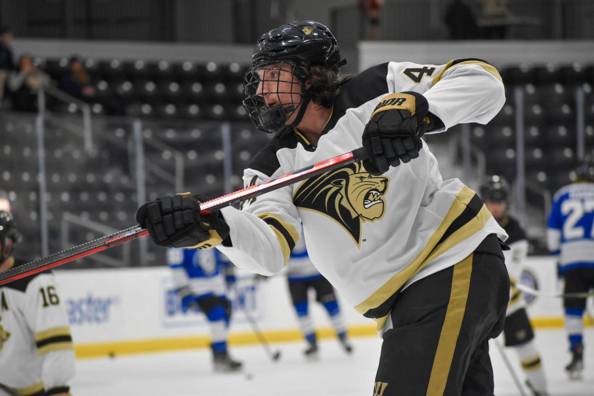 Brett Bell takes a shot during practice prior to a game against Weber State.