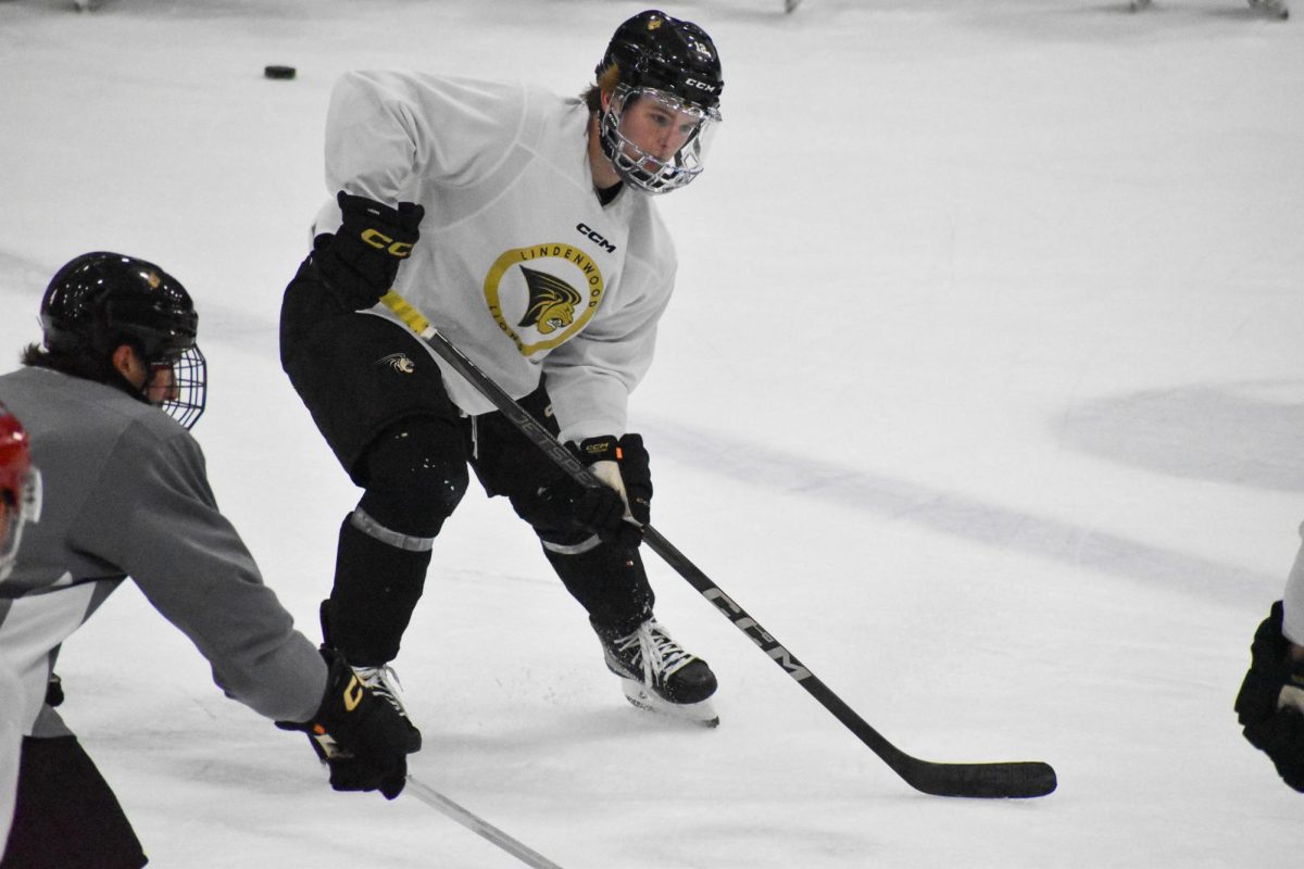 Ethan Zielke prepares for a faceoff in pre-season practice at Centene Community Ice Center. 