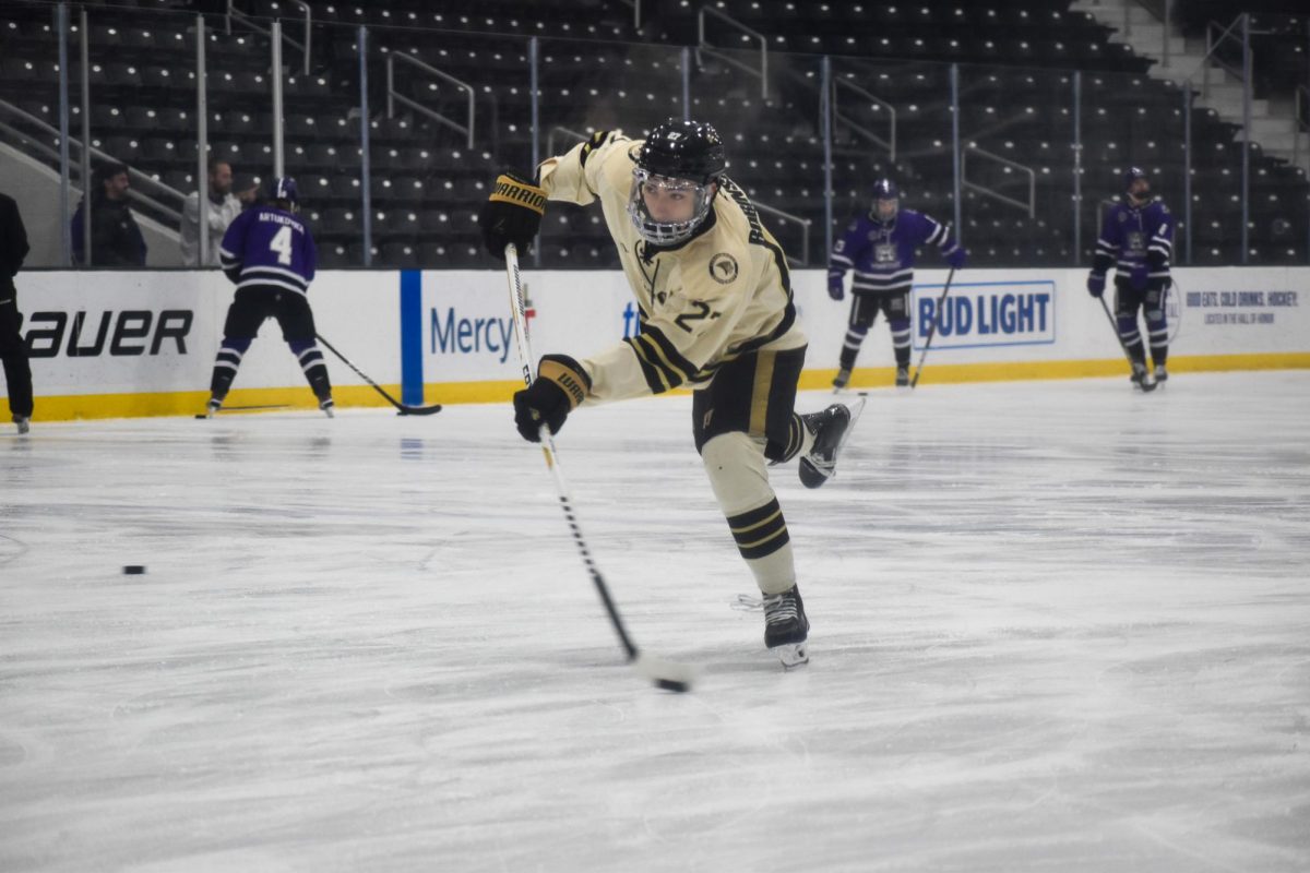 Brett Robinson practices his shot prior to a game against Weber State. 