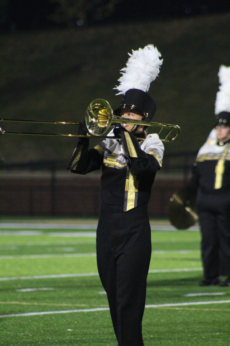 Lindenwood marching band member Ava  performs at Hunter Stadium. 