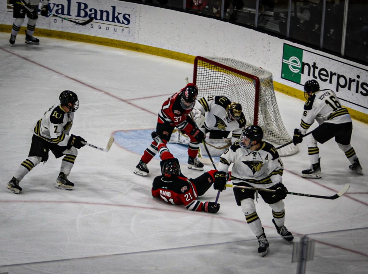 Goalie Owen Bartoszkiewicz blocks a shot on goal from a UNLV Rebel. 