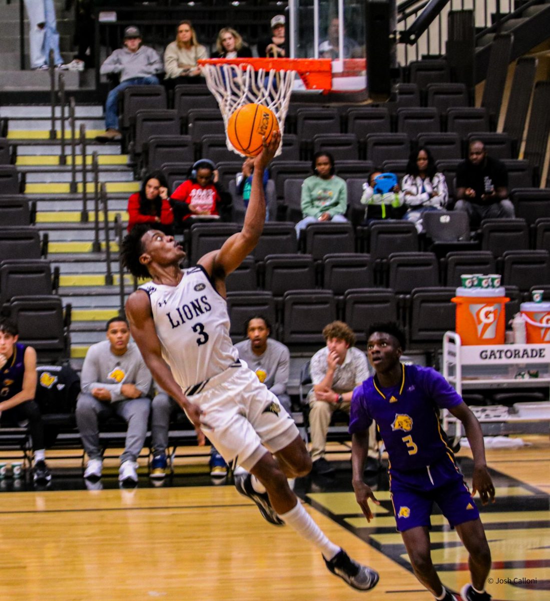 Markeith Browning goes up for a layup against the University of Health and Science in St. Louis. 