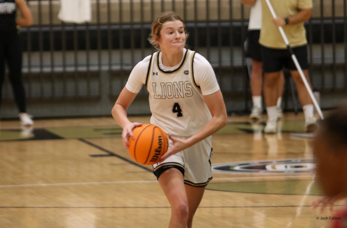 Ellie Brueggemann looks to pass the ball to a Lindenwood teammate during a game against Bradley University. 