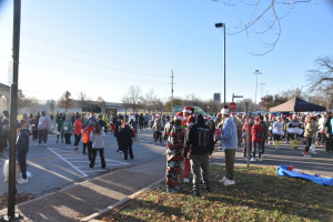 Participants in the Santa Dash gather after the event.