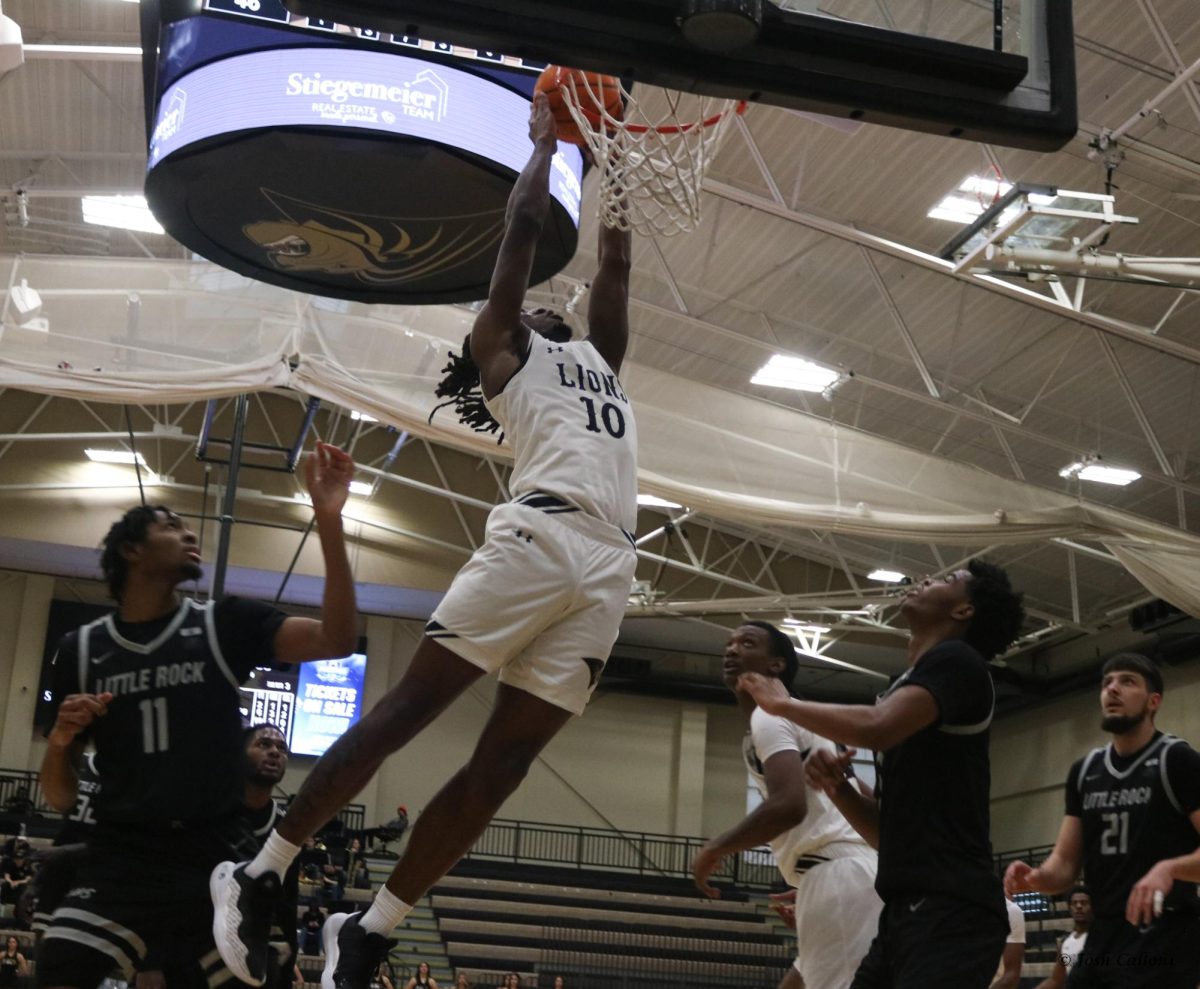 Jadis Jones dunks during a game against Little Rock. 